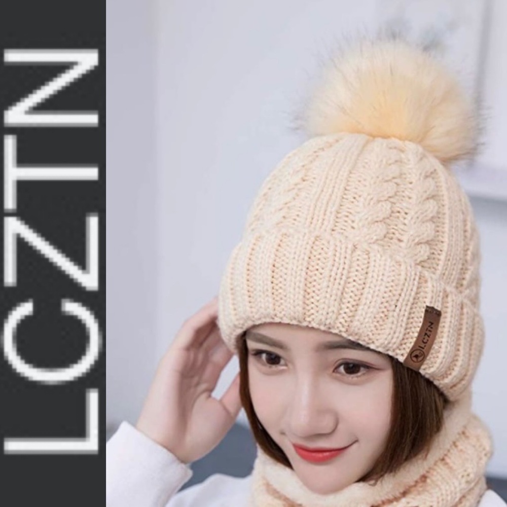 Woman’s Puff Fur Hand Knitted Beanie